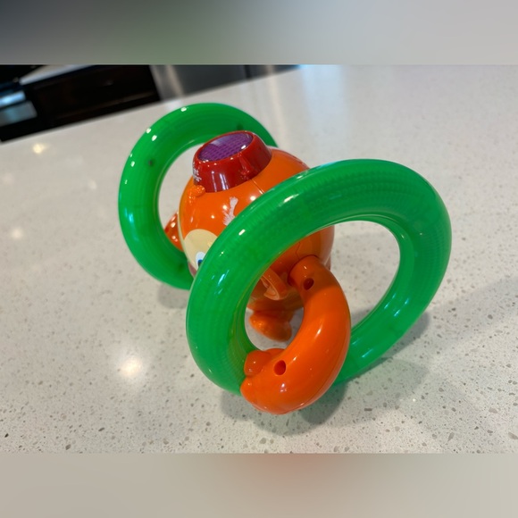 Bright starts roll and glow monkey baby toy with lights and melodies - Picture 4 of 4